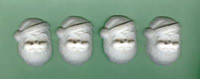 Santa Clause head shaped plaster of paris set of 12.  
