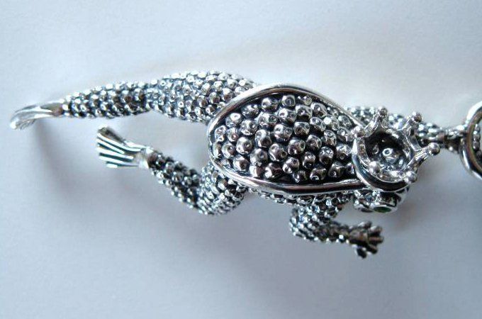 Includes black leather cord bracelet and toad charm 925 Sterling 
