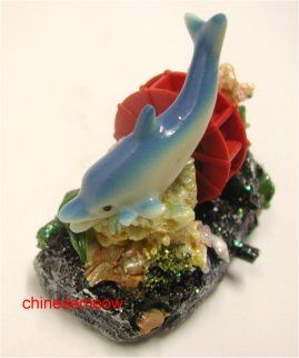 This poly resin ornament is finely hand painted of non toxic and non 